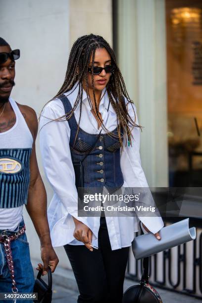 Guest is seen outside Jean Paul Gaultier during Paris Fashion Week - Haute Couture Fall Winter 2022 2023 : Day Three on July 06, 2022 in Paris,...