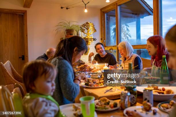 christmas roast dinner with the family - sunday roast stock pictures, royalty-free photos & images