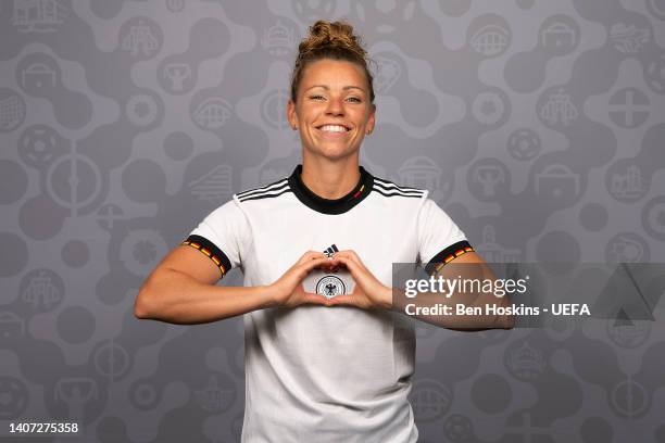 Linda Dallmann of Germany poses for a portrait during the official UEFA Women's EURO 2022 portrait session on April 04, 2022 in Rheda-Wiedenbruck,...
