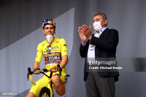 Wout Van Aert of Belgium and Team Jumbo - Visma Yellow Leader Jersey and Eddy Merckx of Belgium ex-pro rider prior to the 109th Tour de France 2022,...