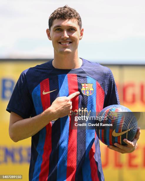 Andreas Christensen poses for the media as he is presented as a FC Barcelona player at Ciutat Esportiva Joan Gamper on July 07, 2022 in Sant Joan...