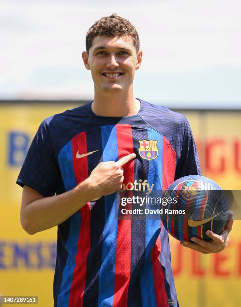 Andreas Christensen poses for the media as he is presented as a FC Barcelona player at Ciutat Esportiva Joan Gamper on July 07, 2022 in Sant Joan...