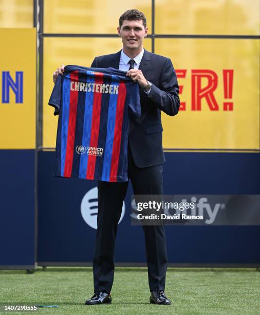 Andreas Christensen poses for the media as he is presented as a FC Barcelona player at Ciutat Esportiva Joan Gamper on July 07, 2022 in Sant Joan...