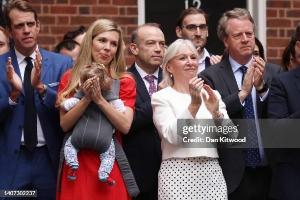 Carrie Johnson, and baby Romy, Culture Secretary Nadine Dorries and Scotland Secretary Alister Jack look on as Prime Minister Boris Johnson addresses...