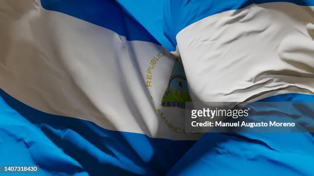 flag of nicaragua - nicaragua fotografías e imágenes de stock