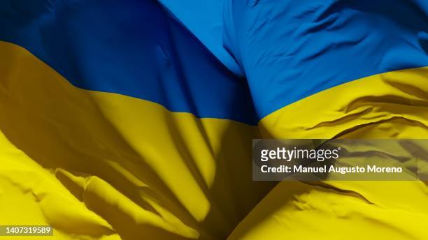 flag of ukraine - rebel flag backgrounds stock pictures, royalty-free photos & images