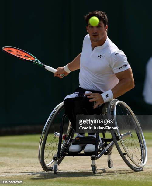 Gustavo Fernandez of Argentina plays a forehand against Nicolas Peifer of France during their Men's Wheelchair singles Quarter-Final on day eleven of...