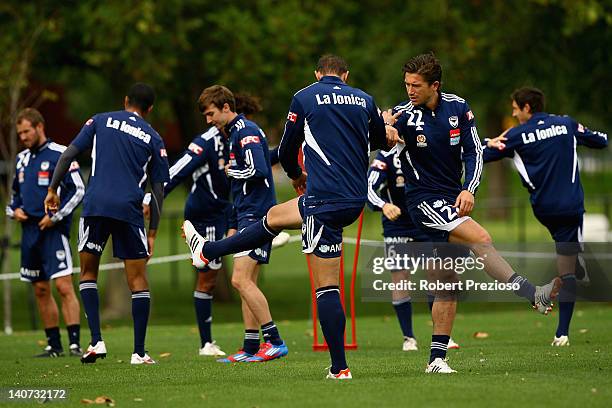 Harry Kewell stretches during a Melbourne Victory A-League training session at Gosch's Paddock on March 6, 2012 in Melbourne, Australia.