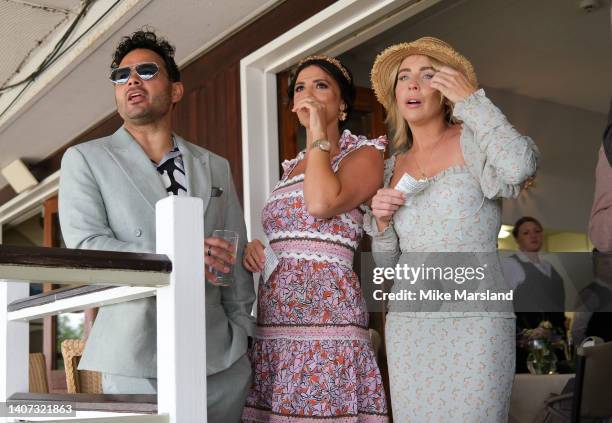 Ryan Thomas, Lucy Mecklenburgh and Lydia Bright attend Ladies Day at the Newmarket Racecourse July Festival on July 07, 2022 in Newmarket, England.