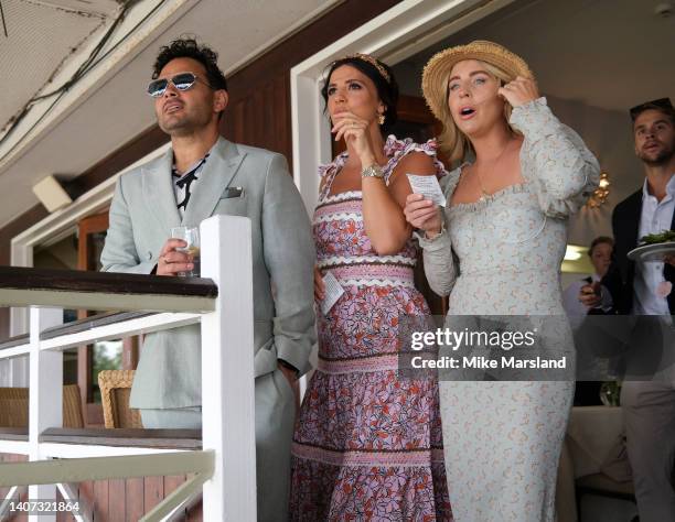 Ryan Thomas, Lucy Mecklenburgh and Lydia Bright attend Ladies Day at the Newmarket Racecourse July Festival on July 07, 2022 in Newmarket, England.