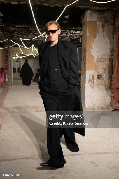 Model walks the runway during the Vetements Haute Couture Fall Winter 2022 2023 show as part of Paris Fashion Week on July 07, 2022 in Paris, France.