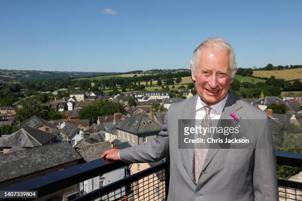 Prince Charles, Prince Of Wales poses for a photograph at the viewing platform during a visit to Hay Castle on July 07, 2022 in Hay-on-Wye,...