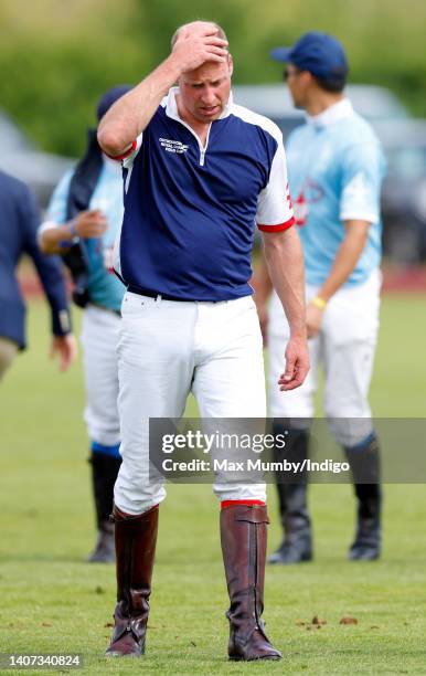 Prince William, Duke of Cambridge attends the Out-Sourcing Inc. Royal Charity Polo Cup at Guards Polo Club, Flemish Farm on July 6, 2022 in Windsor,...