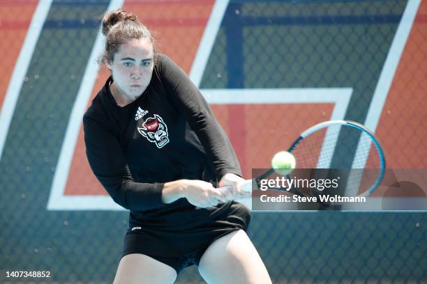 Nell Miller of the NC State Wolfpack returns against the Miami Hurricanes during the Division I Men’s and Women’s Singles and Doubles Tennis...