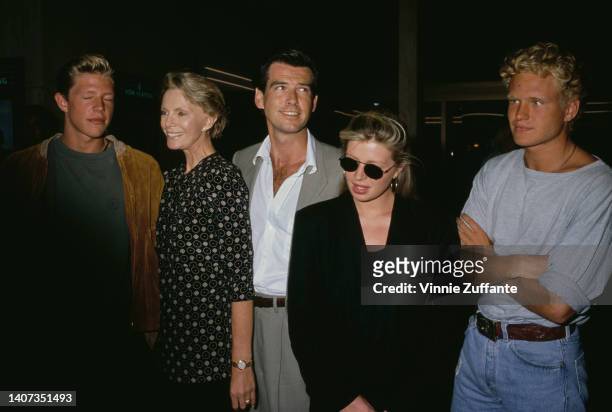 Pierce Brosnan stands beside his wife Cassandra Harris , their son Christopher Brosnan , daughter Charlotte Brosnan and her boyfriend Alex Smith at...
