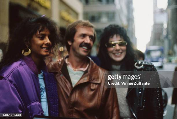 Susie Coelho, Sonny Bono and Cher smile, United States, circa 1977.