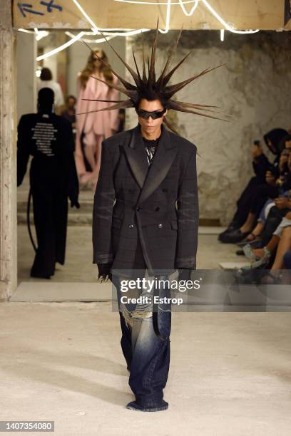 Model walks the runway during the Vetements Haute Couture Fall Winter 2022 2023 show as part of Paris Fashion Week on July 7, 2022 in Paris, France.