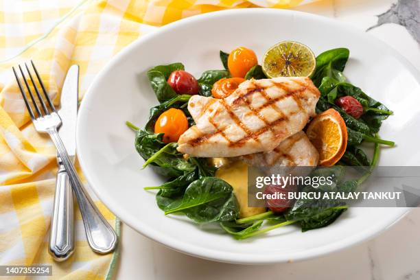 grilled salmon with sautéed spinach - low carb diet stock pictures, royalty-free photos & images