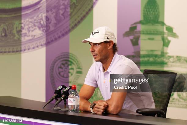 Rafael Nadal of Spain talks to the Media to announce his withdrawal from the tournament during a press conference on day eleven of The Championships...