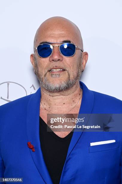 Pascal Obispo attends the "Diner De La Mode" to benefit Sidaction at Pavillon Cambon Capucines on July 07, 2022 in Paris, France.