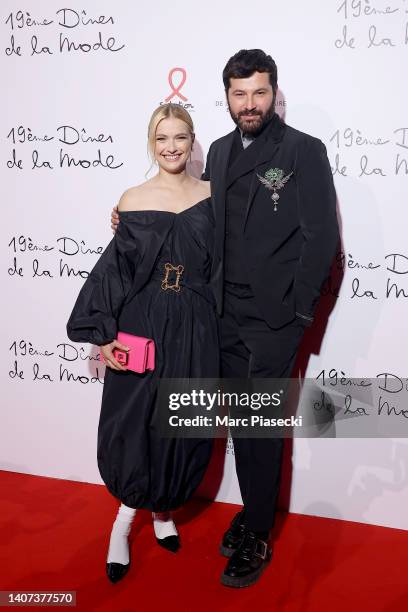 Camille Razat and Gherardo Felloni attend the "Diner De La Mode" to benefit Sidaction at Pavillon Cambon Capucines on July 07, 2022 in Paris, France.