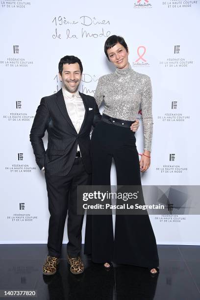 Alexis Mabille and a guest attend the "Diner De La Mode" to benefit Sidaction at Pavillon Cambon Capucines on July 07, 2022 in Paris, France.