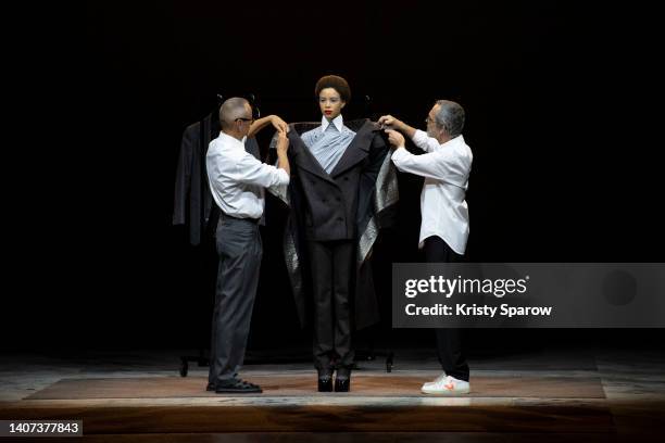 Designers Viktor Horsting and Rolf Snoeren dress a model during the Viktor & Rolf Haute Couture Fall Winter 2022 2023 show as part of Paris Fashion...