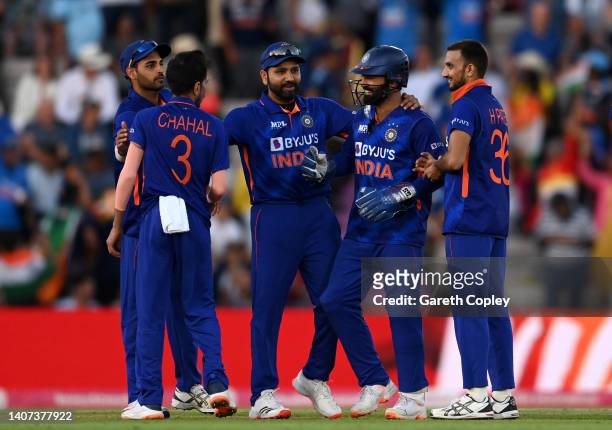 India celebrate after Moeen Ali of England is stumped by Dinesh Karthik of India during the 1st Vitality IT20 match between England and India at...