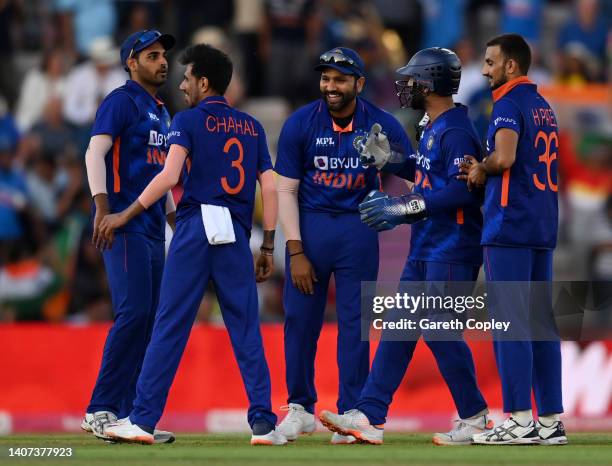 India celebrate after Moeen Ali of England is stumped by Dinesh Karthik of India during the 1st Vitality IT20 match between England and India at...