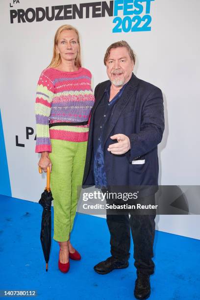 Armin Rohde and his partner Karen Boehne attend the German Producers Alliance Summer Party at Tipi am Kanzleramt on July 07, 2022 in Berlin, Germany.