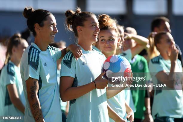 Sara Doorsoun, Felicitas Rauch and Lina Magull of Germany look on during the UEFA Women's Euro 2022 Germany Press Conference And Training Session at...