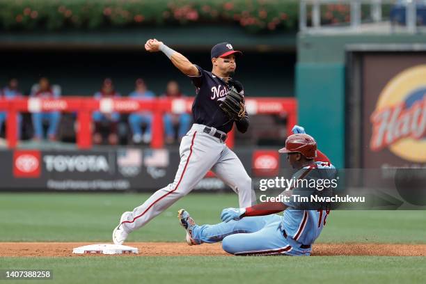 Cesar Hernandez of the Washington Nationals forces out Didi Gregorius of the Philadelphia Phillies during the second inning at Citizens Bank Park on...