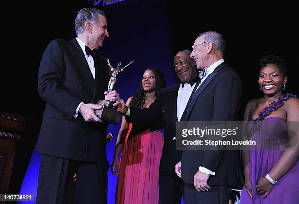 Stephen Ross presents the ROBIE Humanitarian Award to former NFL Commissioner and Chairman, Board of Directors Georgetown University Paul Tagliabue...