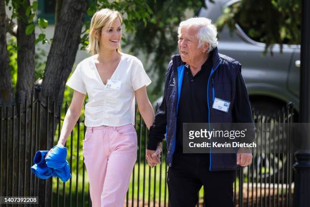 Robert Kraft, CEO of the New England Patriots, and Dana Blumberg walk to lunch during the Allen & Company Sun Valley Conference on July 07, 2022 in...