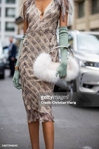 Cindy Bruna seen wearing dress, mint green gloves, white faux fur bag outside Fendi during Paris Fashion Week - Haute Couture Fall Winter 2022 2023 :...
