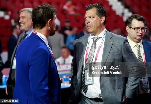 General manager Bill Guerin of the Minnesota Wild looks on from the draft floor prior to the first round of the 2022 Upper Deck NHL Draft at Bell...