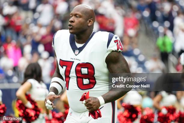 Laremy Tunsil of the Houston Texans runs onto the field during introductions against the Jacksonville Jaguars prior to an NFL game at NRG Stadium on...