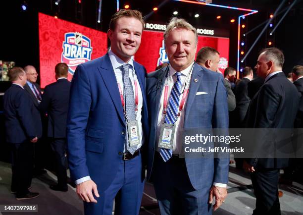 Ryan Bowness of the Ottawa Senators and head coach Rick Bowness of the Winnipeg Jets pose for a photo on the draft floor prior to the first round of...