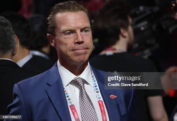 Kris Draper of the Detroit Red Wings looks on prior to the first round of the 2022 Upper Deck NHL Draft at Bell Centre on July 07, 2022 in Montreal,...