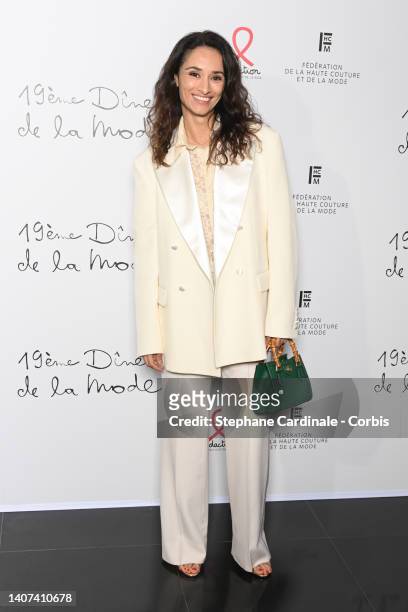 Rachida Brakni attends the "Diner De La Mode" to benefit Sidaction at Pavillon Cambon Capucines on July 07, 2022 in Paris, France.