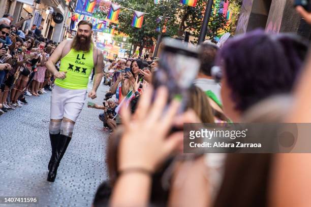 Competitor runs during the High Heels Pride Race at Chueca on July 07, 2022 in Madrid, Spain. Madrid is celebrating their annual Pride Week which...