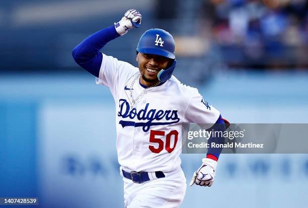 Mookie Betts of the Los Angeles Dodgers celebrates a home run against the Chicago Cubs in the first inning at Dodger Stadium on July 07, 2022 in Los...