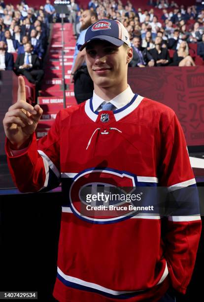 Juraj Slafkovsky of the Montreal Canadiens poses for a picture after being the first overall draft pick during Round One of the 2022 Upper Deck NHL...