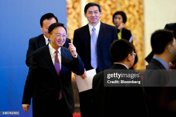 Yang Jiechi, China's foreign minister, leaves after holding a news conference as China's National People's Congress takes place in Beijing, China, on...