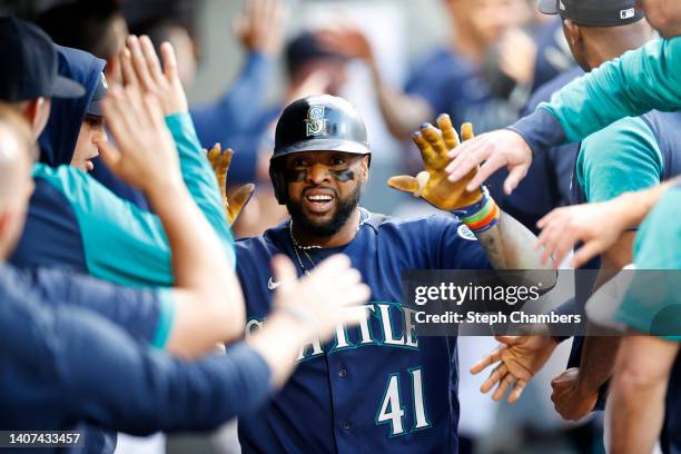 Carlos Santana of the Seattle Mariners reacts after scoring a run during the third inning against the Toronto Blue Jays at T-Mobile Park on July 07,...