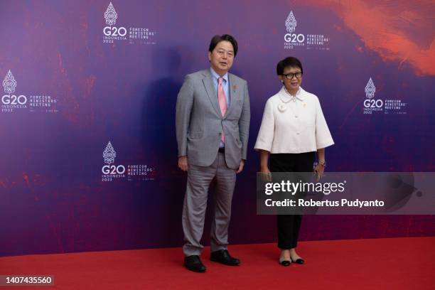 The Indonesian Minister for Foreign Affairs, Retno Marsudi greets the Minister for Foreign Affairs of Japan, Yoshimasa Hayashi during arrival of the...