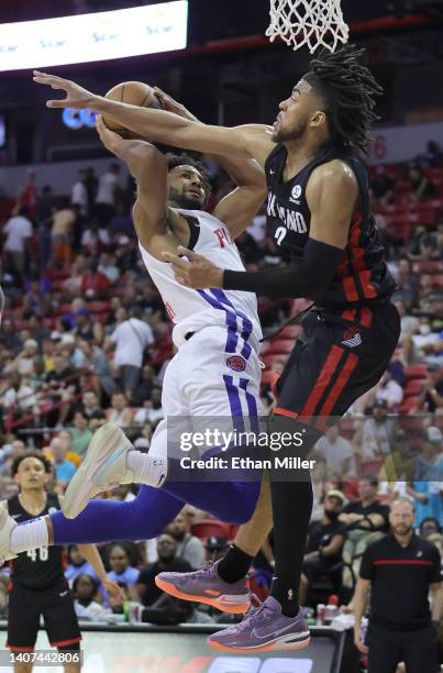 Braxton Key of the Detroit Pistons is fouled by Trendon Watford of the Portland Trail Blazers during the 2022 NBA Summer League at the Thomas & Mack...
