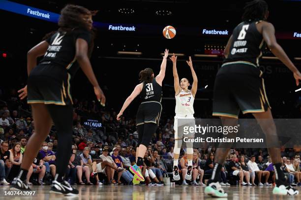 Diana Taurasi of the Phoenix Mercury puts up a three-point shot over Stefanie Dolson of the New York Liberty during the second half of the WNBA game...