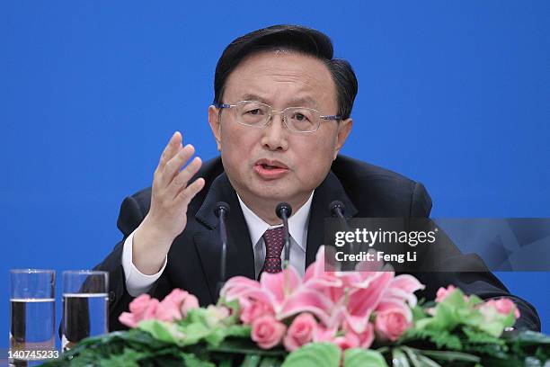 Chinese Foreign Minister Yang Jiechi answers a media question during a press conference of the National People's Congress's annual session at the...