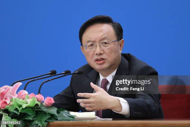 Chinese Foreign Minister Yang Jiechi answers a media question during a press conference of the National People's Congress's annual session at the...